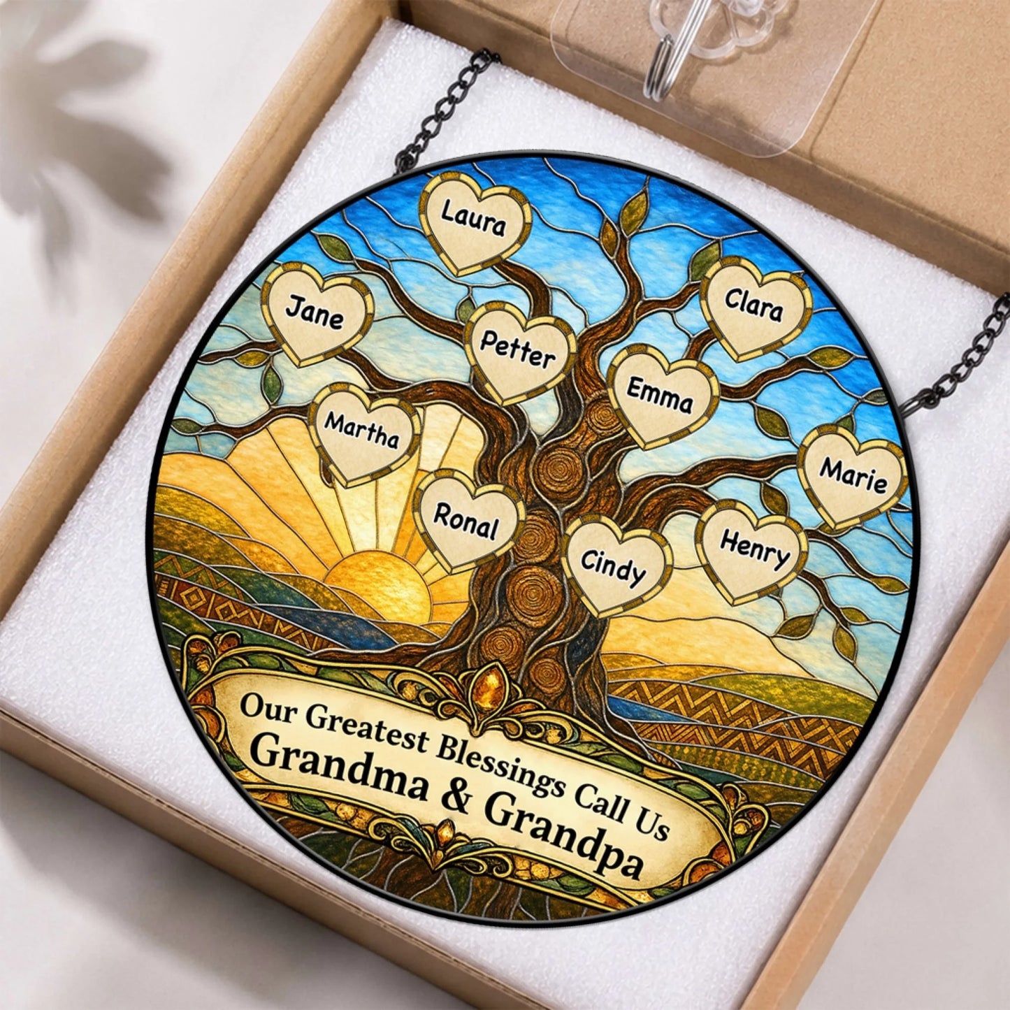 Stained glass family tree suncatcher with personalized heart name tags, a thoughtful home decor gift for grandparents.