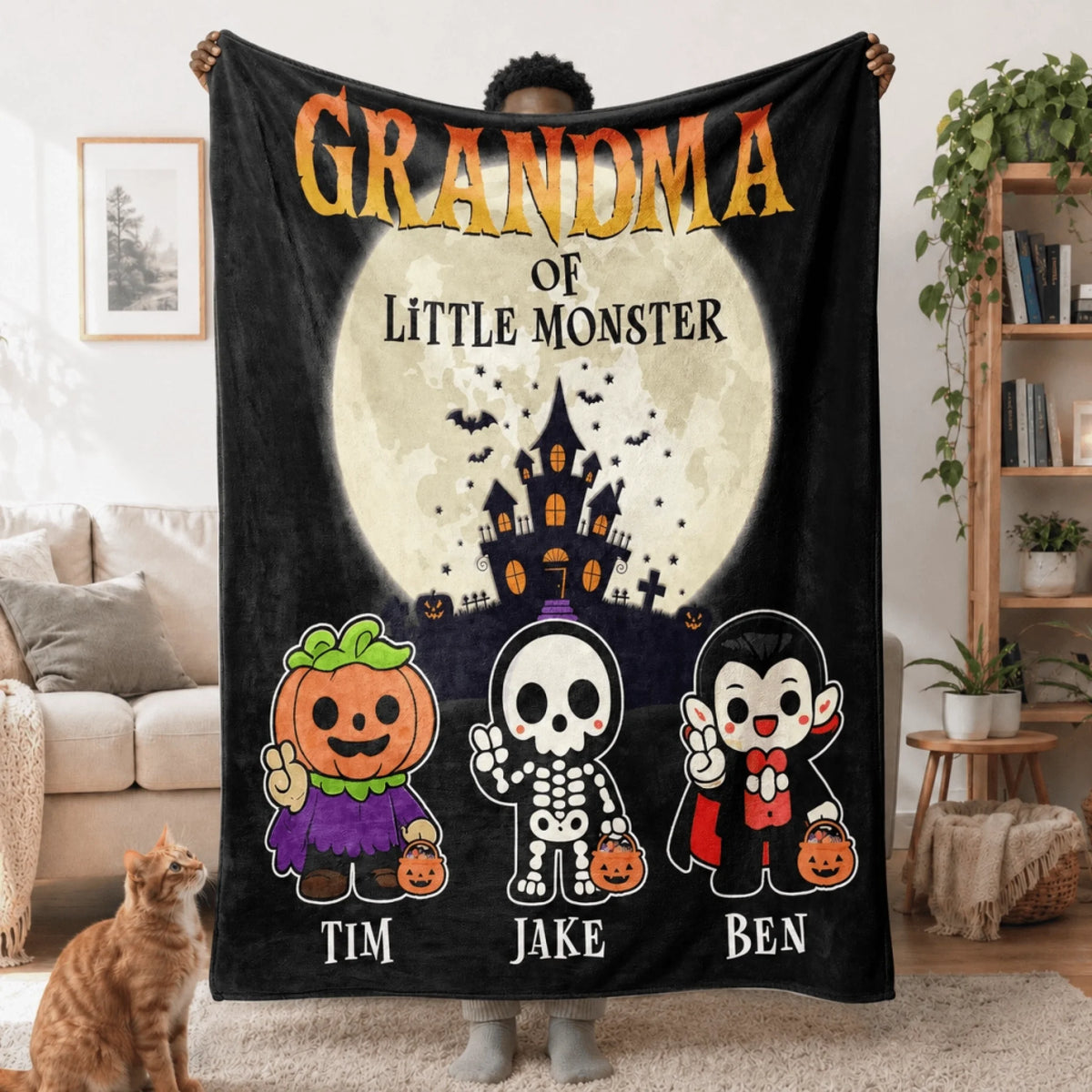Customized Halloween blanket for Grandma, featuring three cute little monsters, a haunted house, and the names Tim, Jake, and Ben.