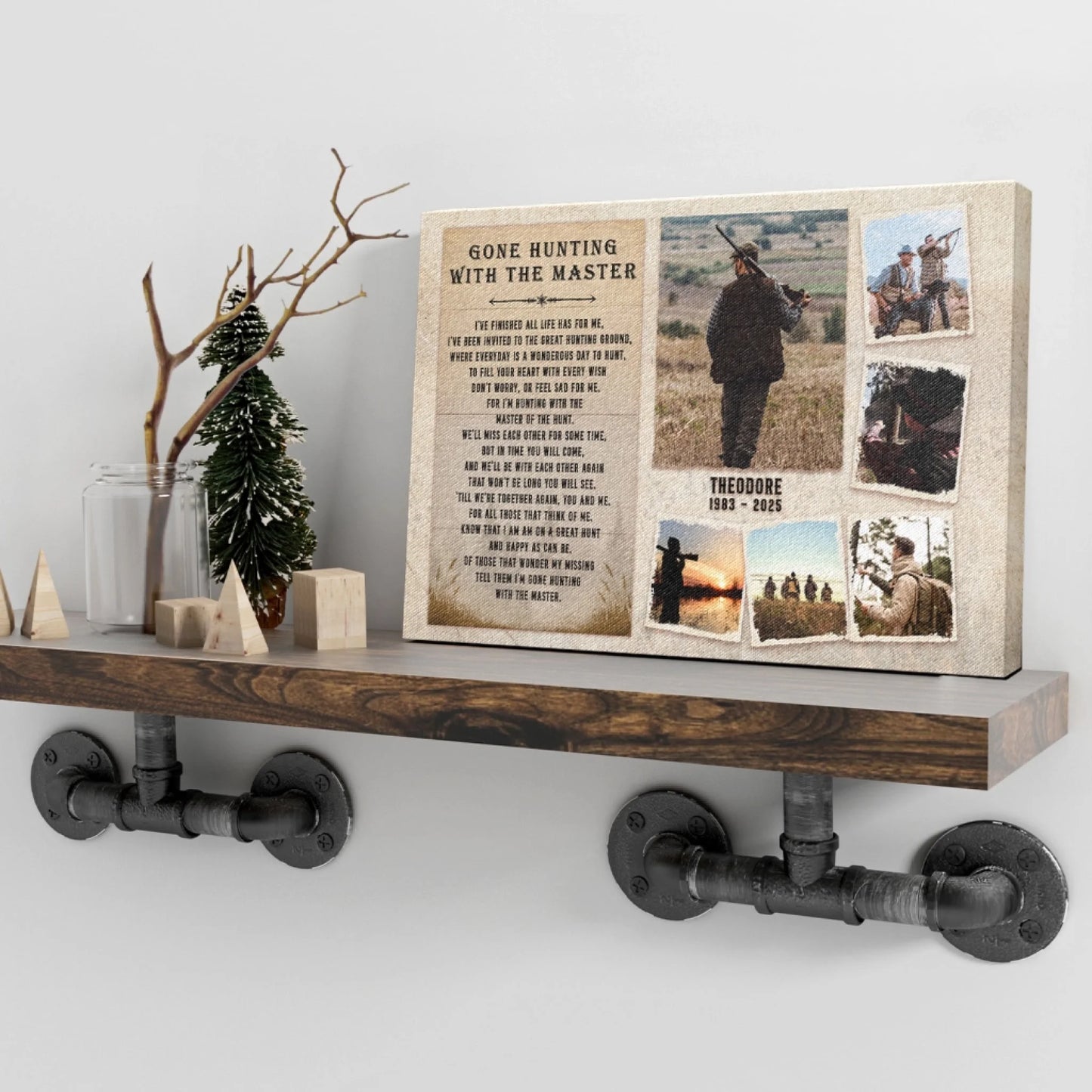 A personalized canvas print with hunting photos and text sits on a rustic wooden shelf, flanked by small decorative trees and glass jars.
