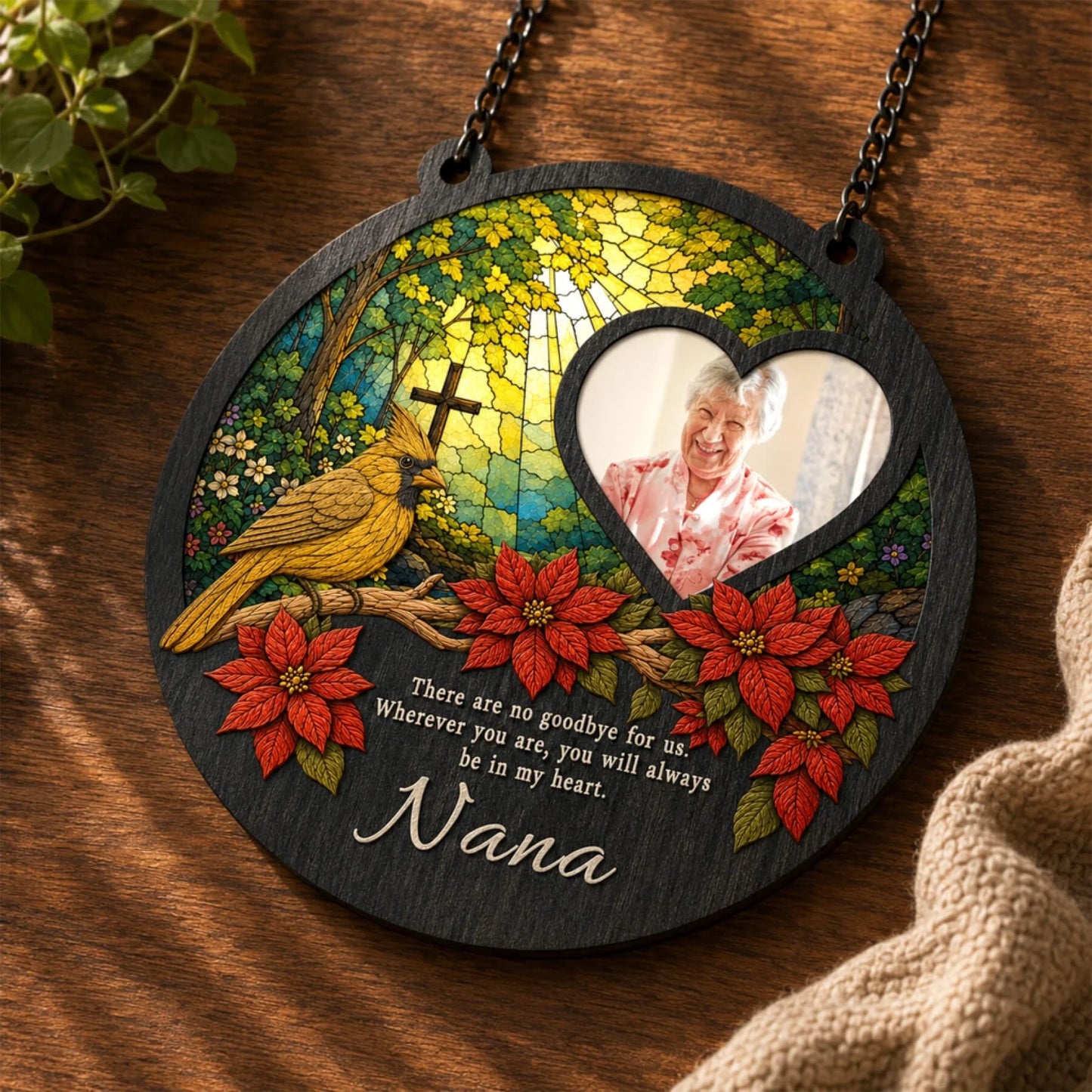 Custom wooden memorial suncatcher with a cardinal and poinsettia design, including a heartfelt Nana photo and quote.