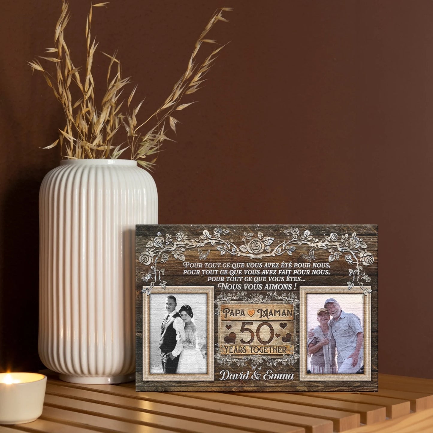 Personalized 50th anniversary canvas gift with couple photos and floral border displayed on a shelf