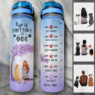 Two water bottles with dog-themed designs and text on a textured surface.