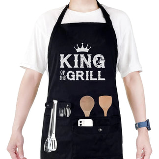 Personalized black apron with lets cook text and kitchen tools front view - Jollimate