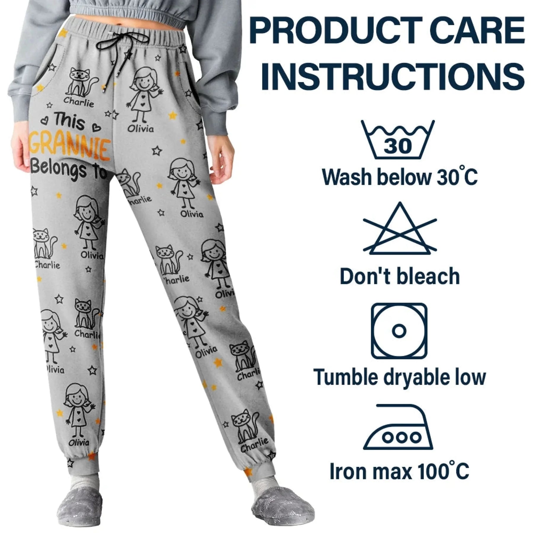 Gray pajama pants with child illustrations and product care instructions on a white background