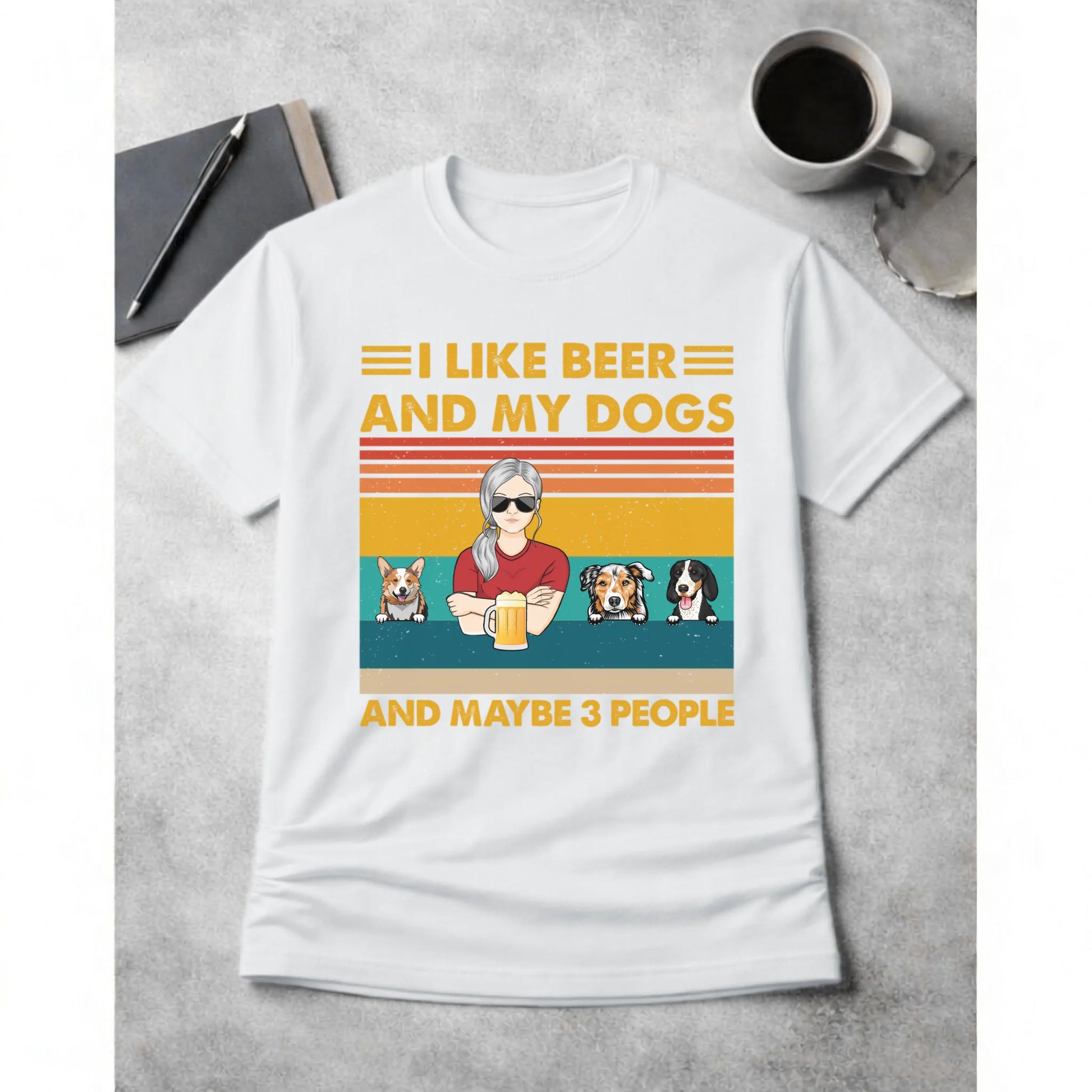 White t-shirt with a graphic design featuring text and images of a person and dogs on a gray surface.