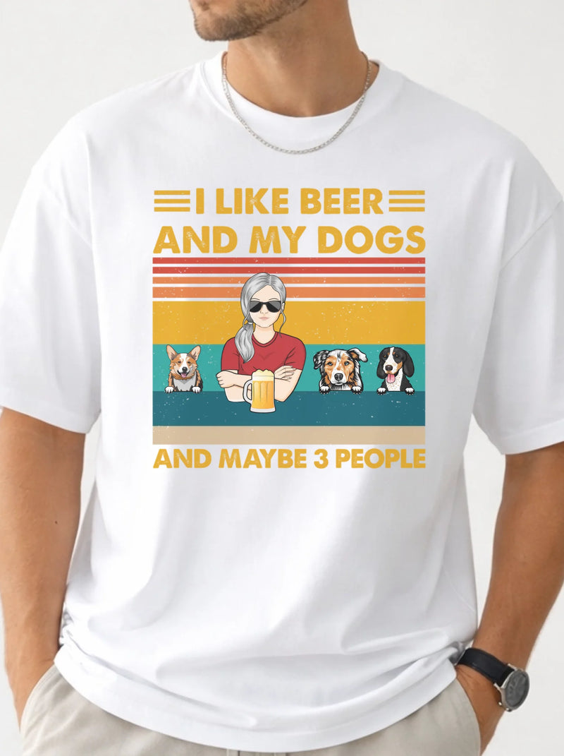 White t-shirt with graphic design featuring a person with dogs and text 'I like beer and my dogs and maybe 3 people' on a white background.