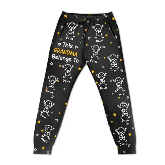 Black pajama pants with white and yellow graphics and text on a white background