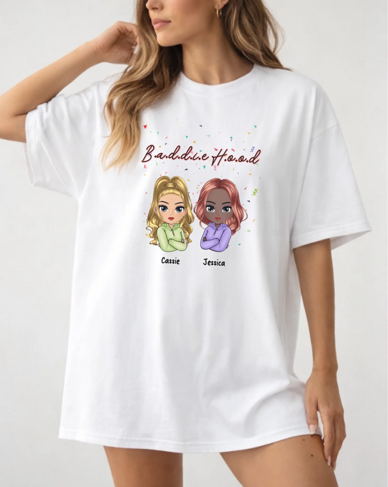 White t-shirt with cartoon characters and text worn by a model on a white background