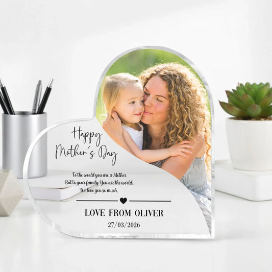 Personalized Mother's Day photo plaque with a photo of a mother and child, placed on a desk with office supplies and a plant.