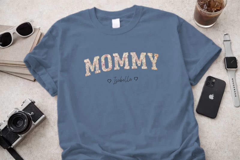 Personalized mommy t-shirt in blue jean with floral block letters and custom names front view - Jollimate