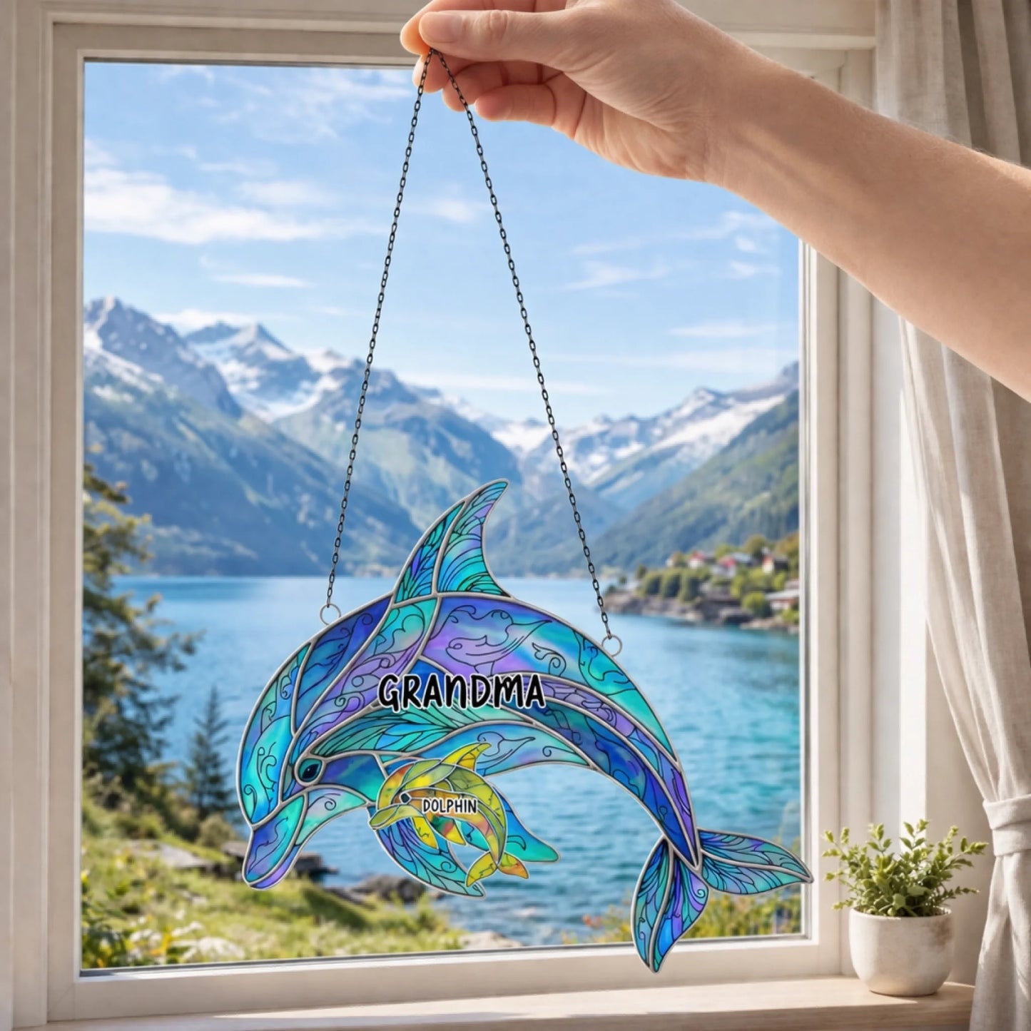 Grandma dolphin stained glass suncatcher with names in window garden background
