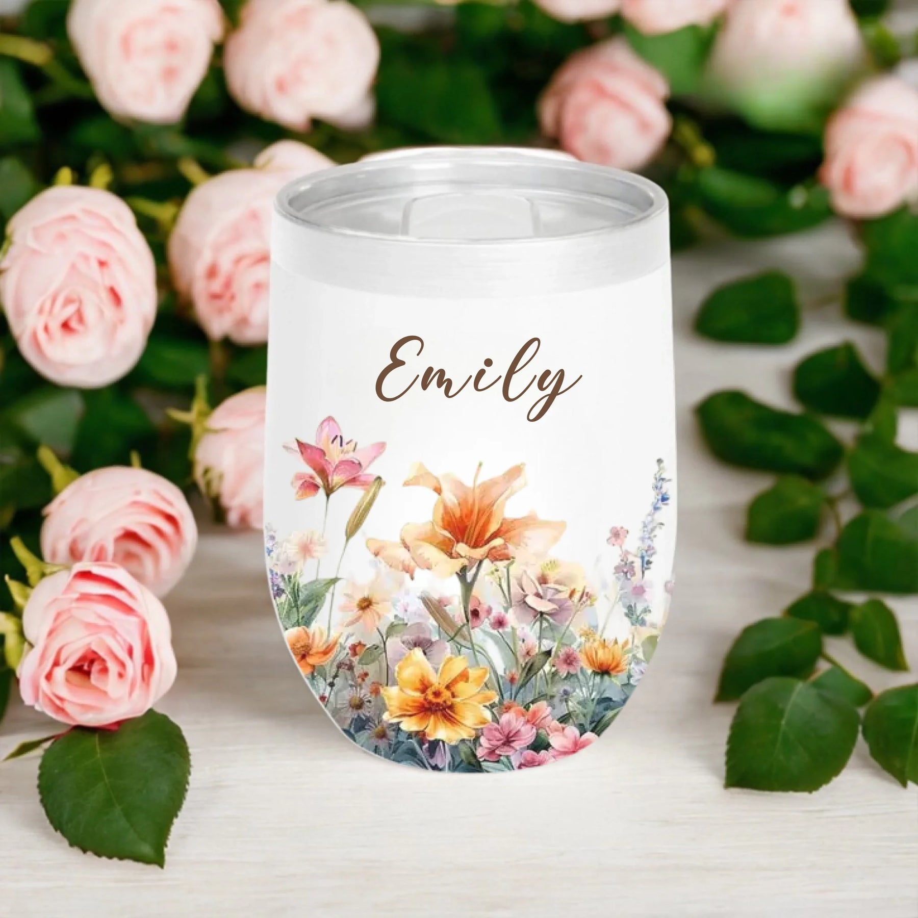 personalized floral tumbler with name emily fall background close up - Jollimate