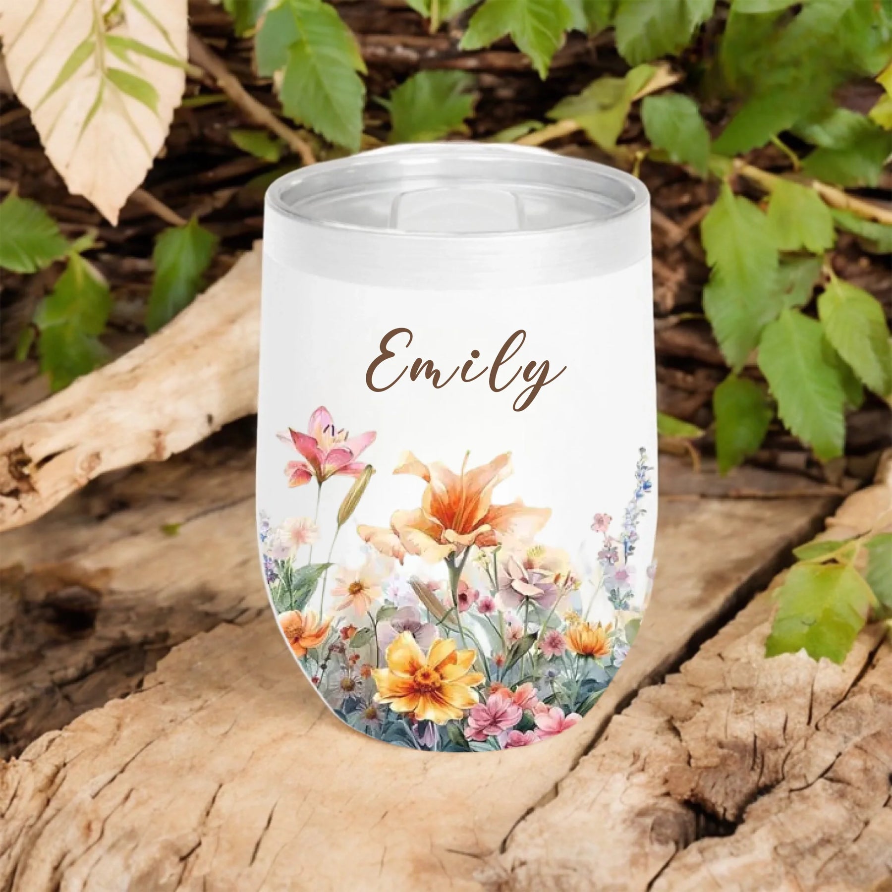 personalized floral tumbler with name emily fall background close up - Jollimate