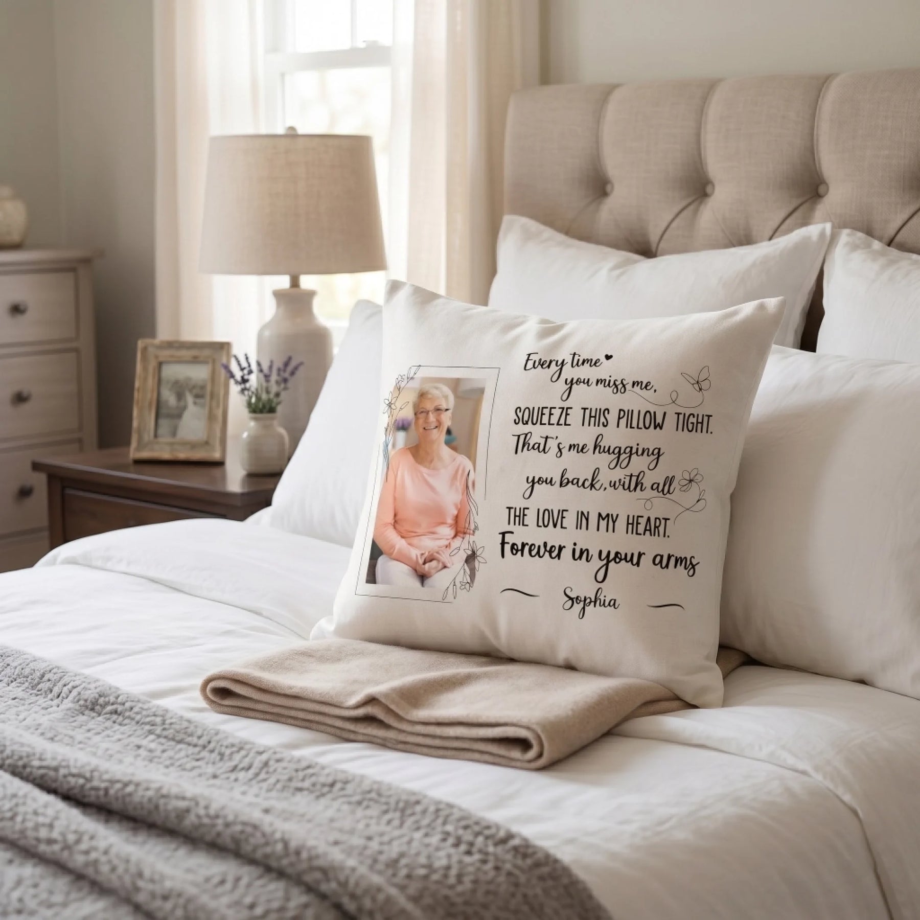 Personalized memorial pillow with photo and heartfelt message placed on beige sofa in cozy sunlit living room