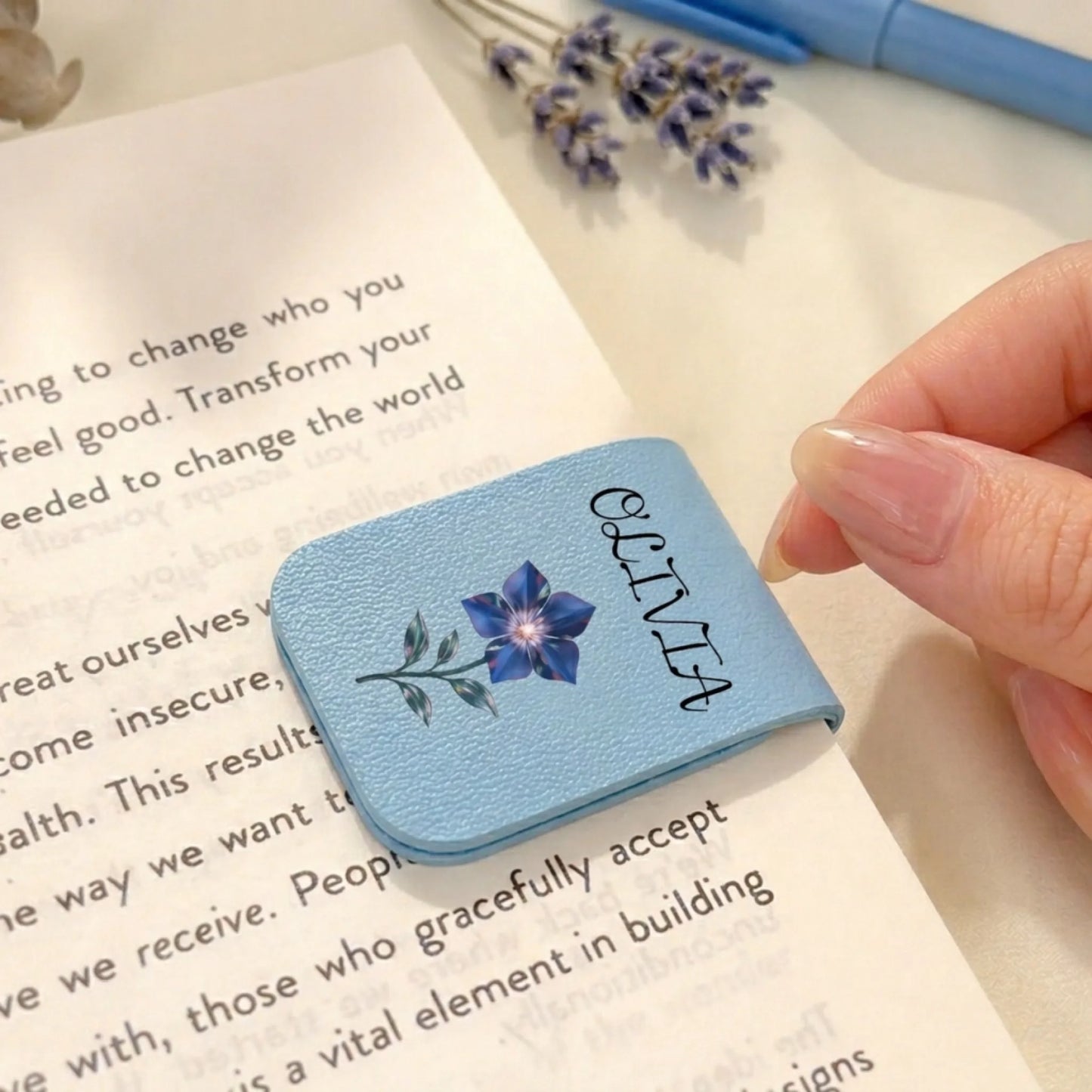 Personalized leather bookmark in purple with floral design and name Olivia front view - Jollimate