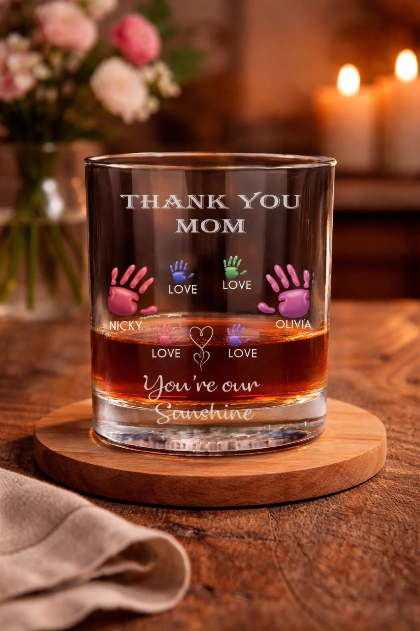 Personalized whiskey glass with thank you mom text and colorful family handprints front view - Jollimate
