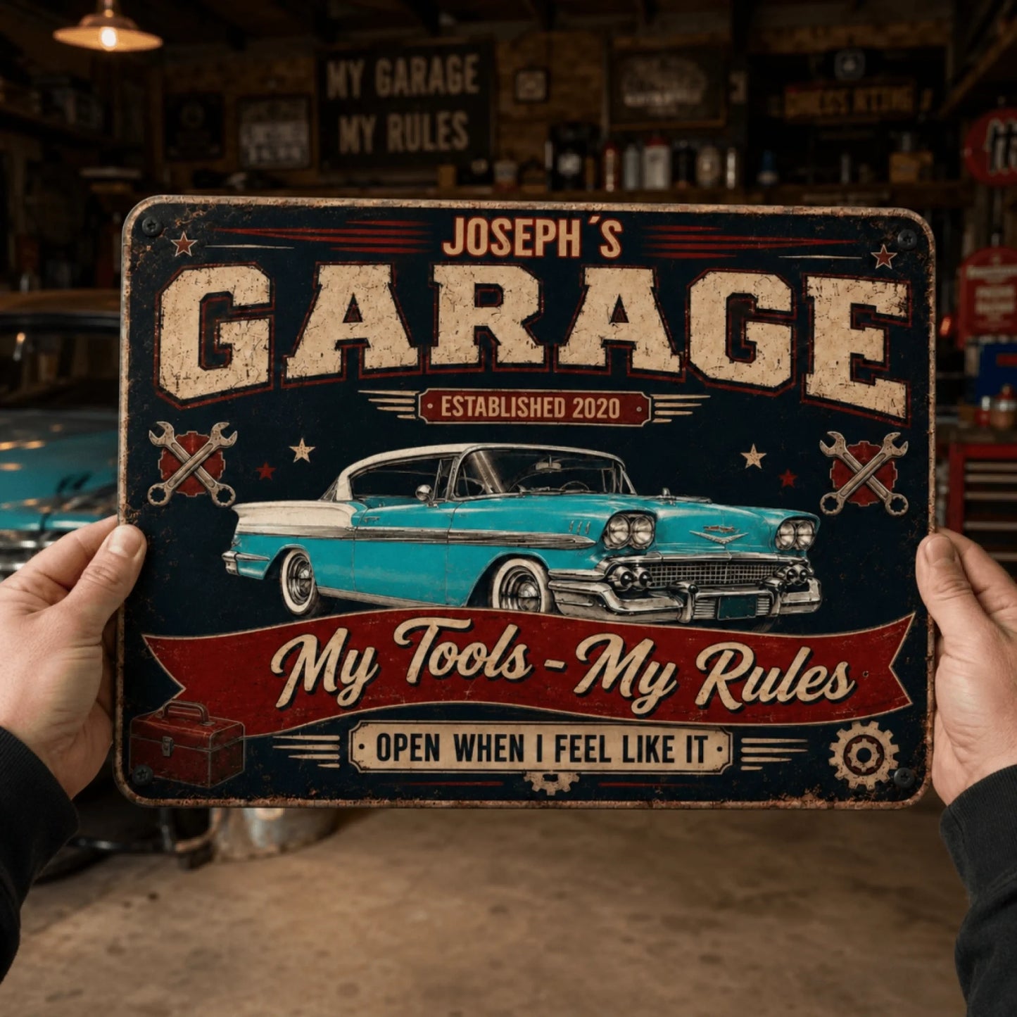 A person's hands hold a vintage-style garage sign featuring a classic turquoise car, 'My Tools - My Rules' text, and a toolbox.