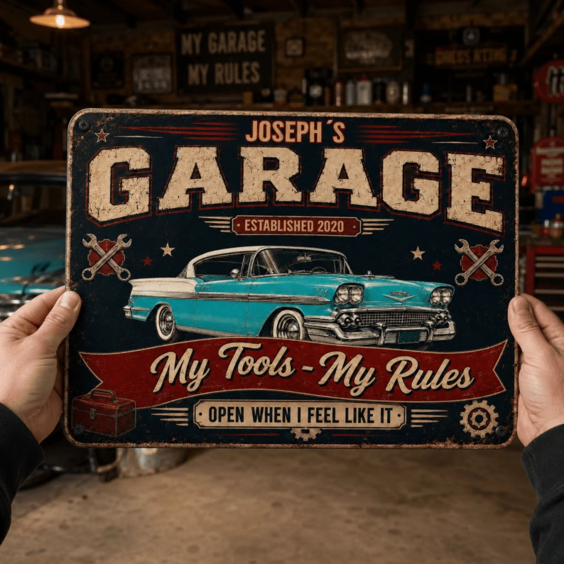 A person's hands hold a vintage-style garage sign featuring a classic turquoise car, 'My Tools - My Rules' text, and a toolbox.