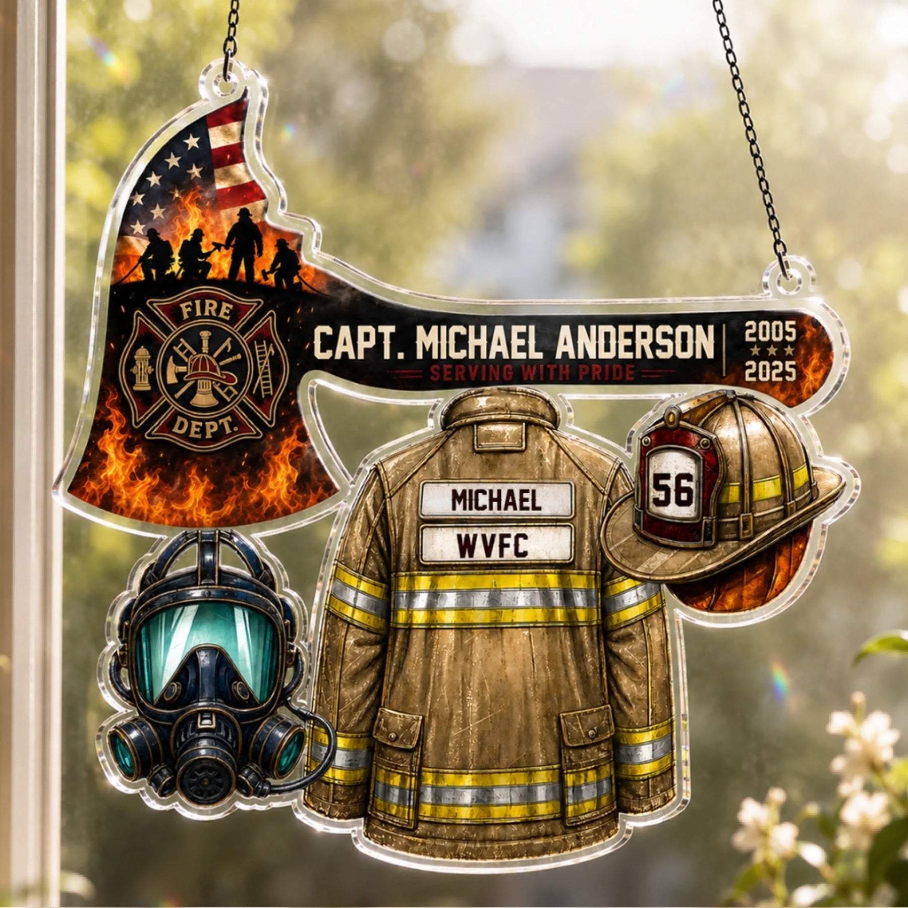 An acrylic hanging firefighter ornament shaped like an axe with an American flag, plus a jacket, helmet, and respirator mask.