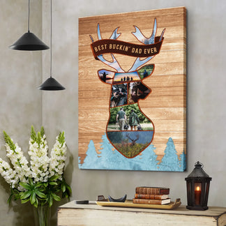 Vertical canvas print with a deer head photo collage, a banner reading "BEST BUCKIN' DAD EVER", and light blue pine trees at the bottom, hanging in a room.