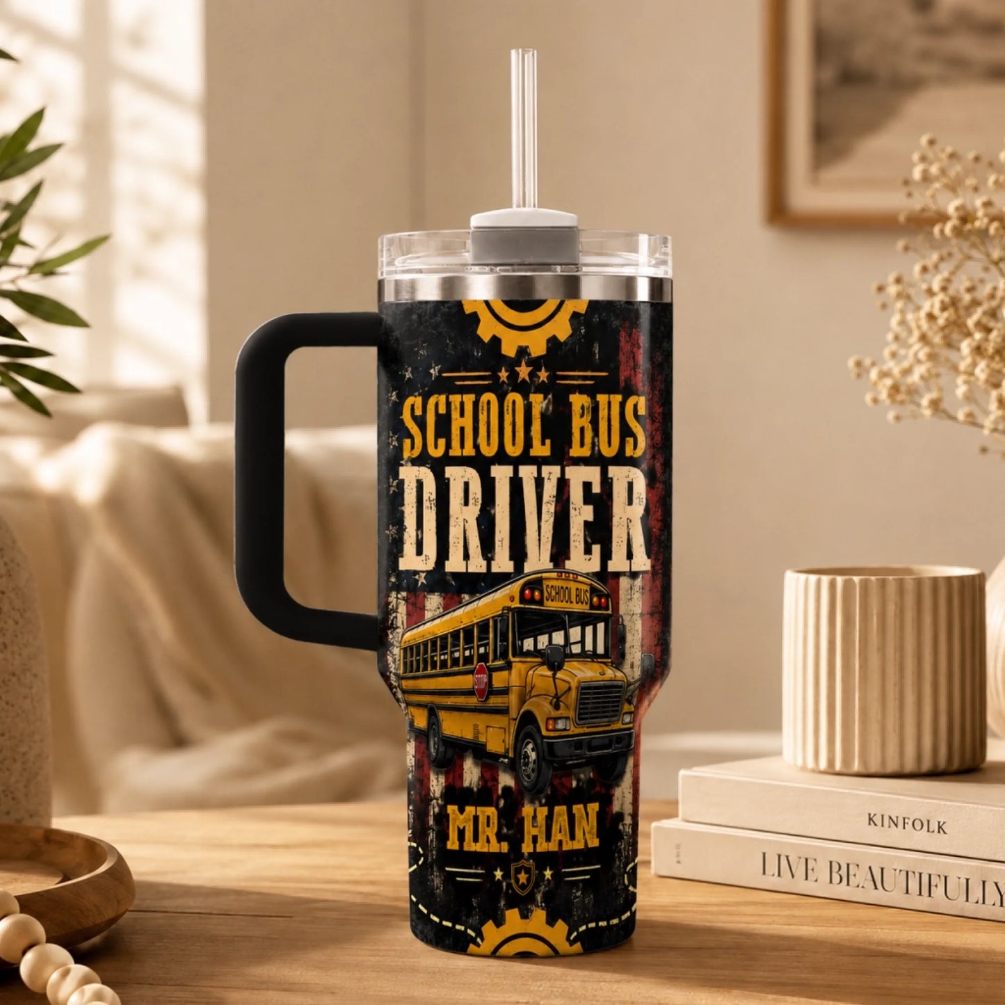 A handled tumbler with a straw, featuring a yellow school bus design, 'School Bus Driver' text, and 'MR. HAN' at the bottom.