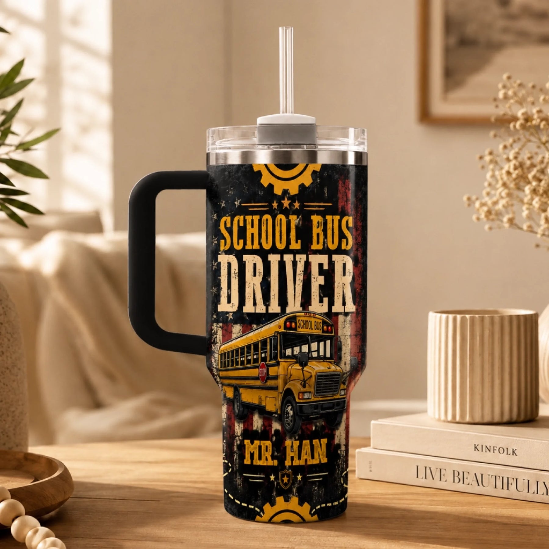 A handled tumbler with a straw, featuring a yellow school bus design, 'School Bus Driver' text, and 'MR. HAN' at the bottom.