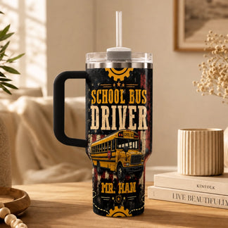 A handled tumbler with a straw, featuring a yellow school bus design, 'School Bus Driver' text, and 'MR. HAN' at the bottom.