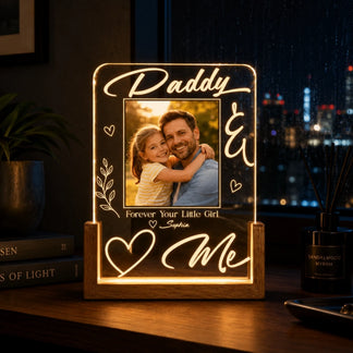 Personalized light-up photo frame with a picture of a man and a child, text 'Daddy & I', and 'Forever Your Little Girl Sophia'.