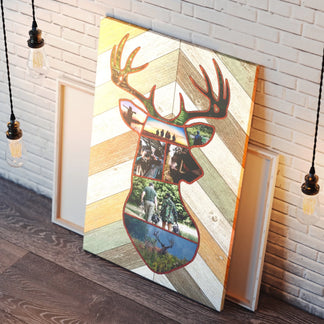 Decorative wall art with deer head design and photo collage on a wooden board, leaning against a brick wall.