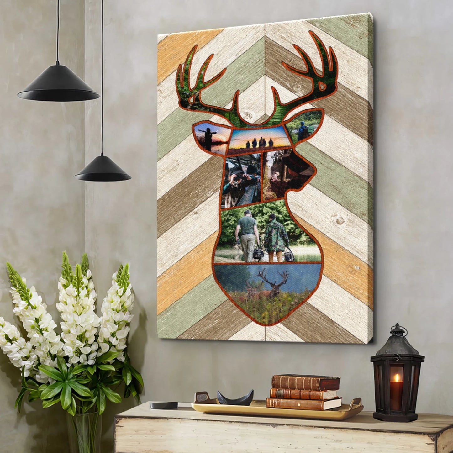 Decorative wall art with deer head design on a wooden panel, placed above a table with books and a lantern.
