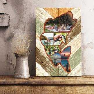 Collage of photos on a decorative board shaped like a butterfly, placed on a wooden surface with a rustic pitcher.