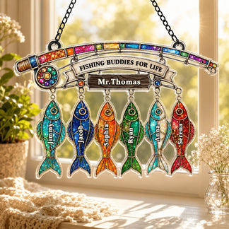 Decorative hanging sign with colorful fish and 'Fishing Buddies for Life' text, placed indoors.