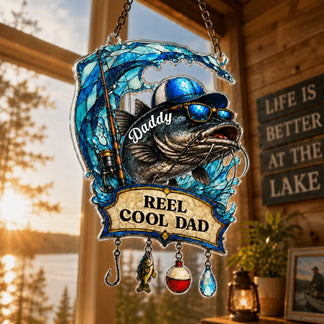 Decorative fishing-themed ornament with a fish wearing sunglasses and a cap, set against a scenic lake background.