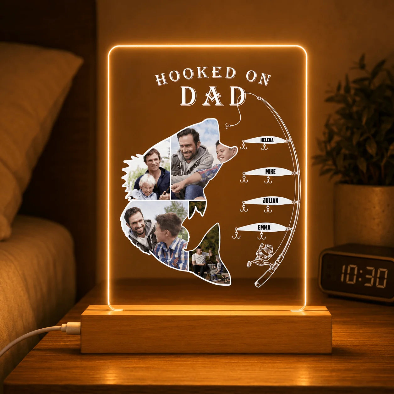 Personalized lamp with fishing theme and family photos on a wooden base.