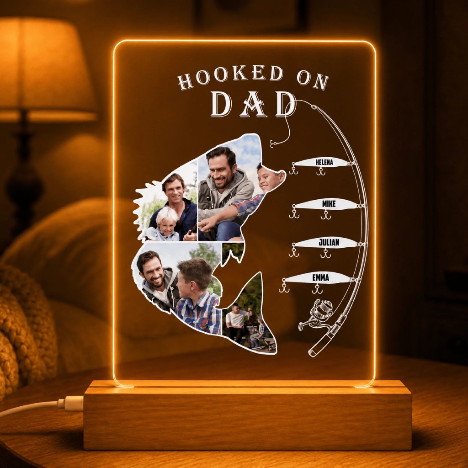 Decorative light with 'Hooked on Dad' text and family photos on a fish-shaped design.