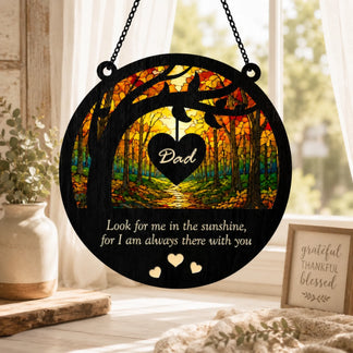 Decorative hanging sign with 'Dad' and a heart-shaped design, placed on a windowsill.