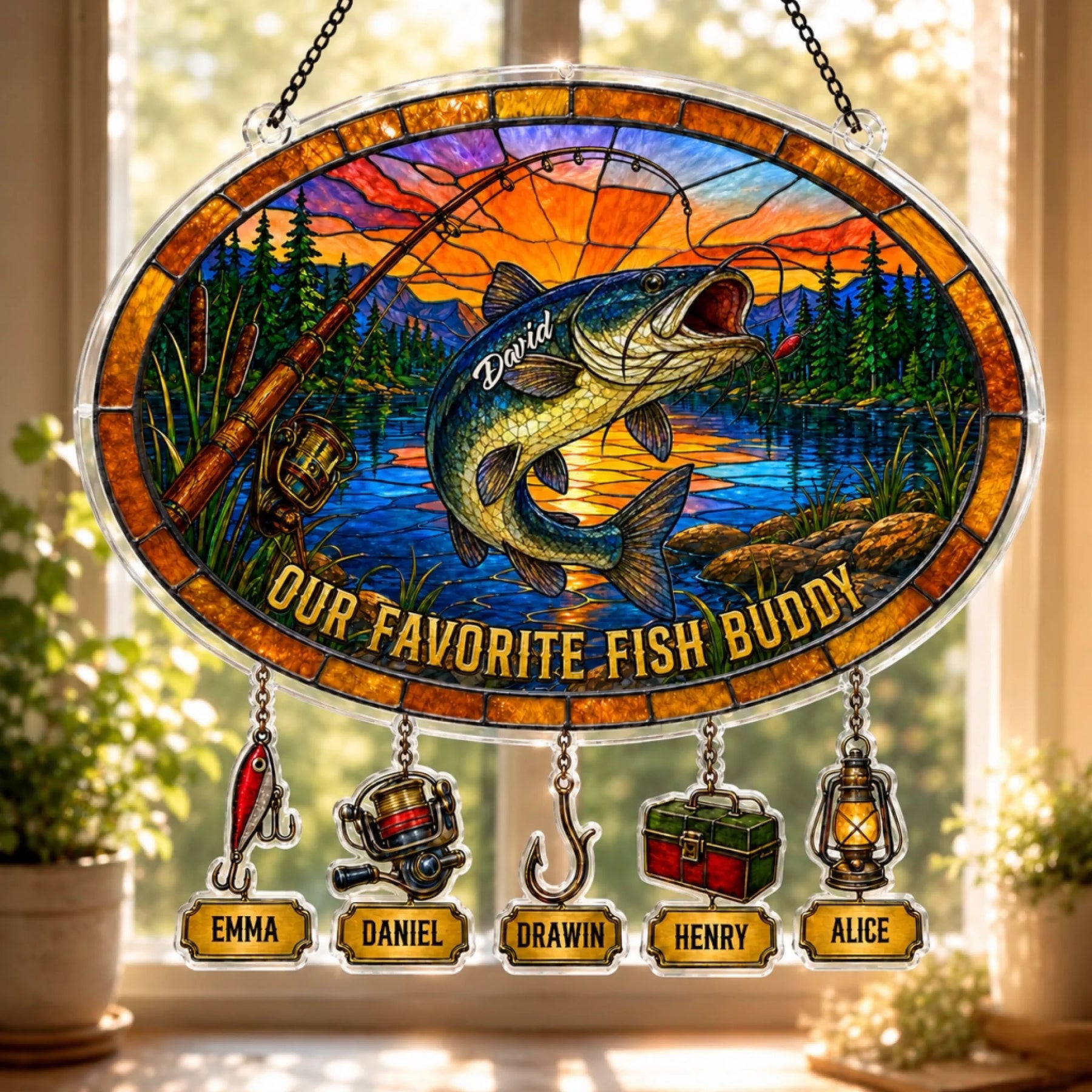 Decorative stained glass panel with fish and fishing elements, featuring names below.