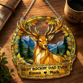 Decorative plaque with a deer design and personalized text on a wooden surface.
