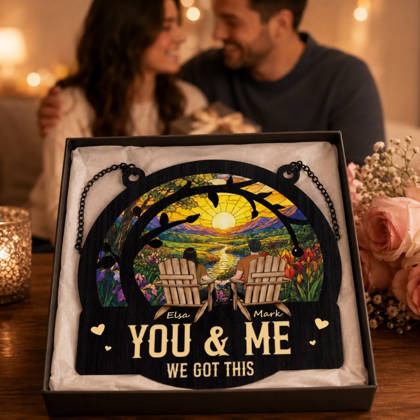 Decorative plaque with 'You & Me We Got This' text, couple in the background