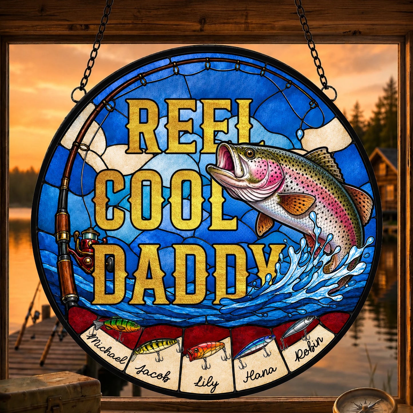 Stained glass panel with fishing theme and 'Reel Cool Daddy' text, set against a sunset lake scene.