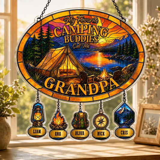 Decorative sign with camping theme and names on a window sill.