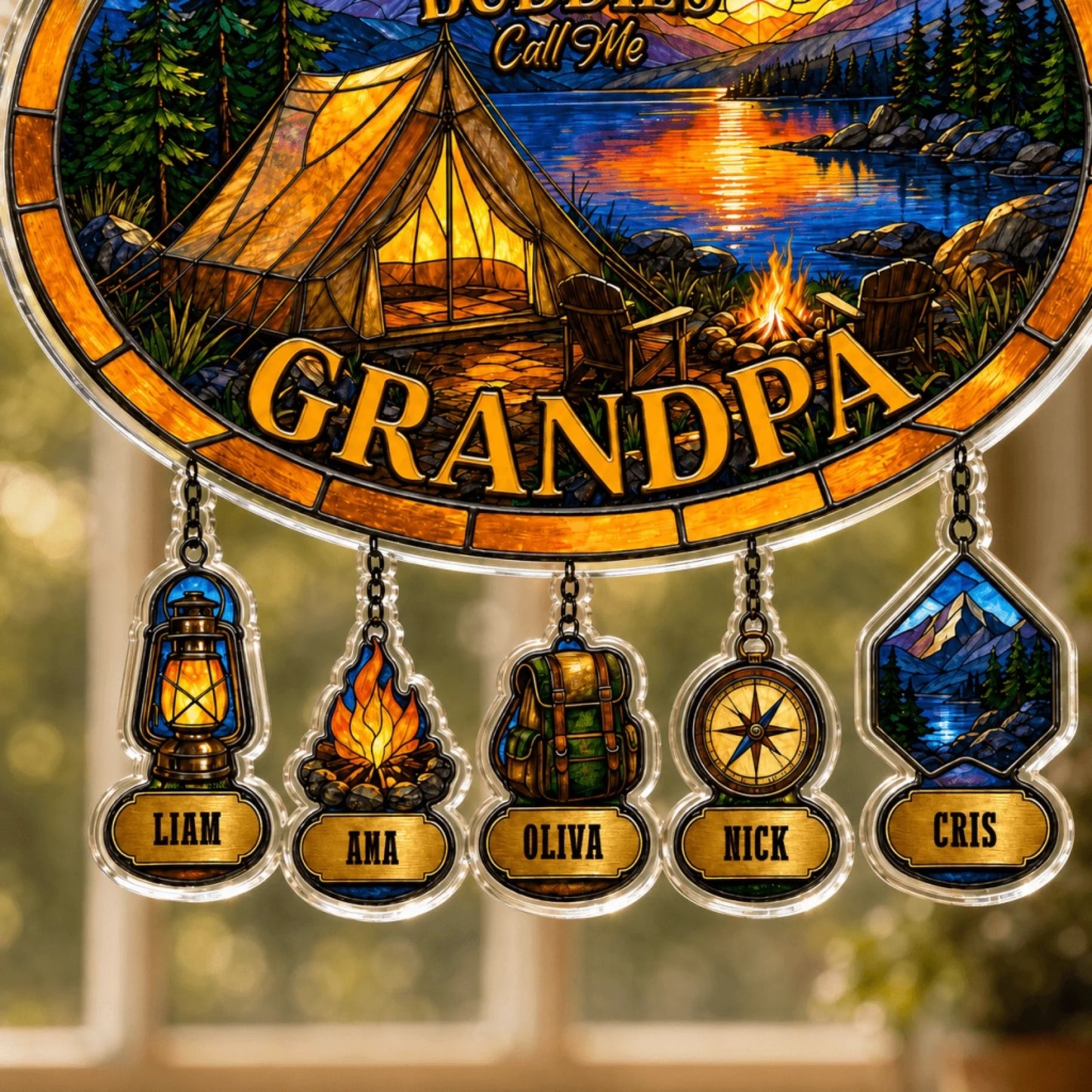 Decorative sign with camping scene and names below, resembling stained glass.