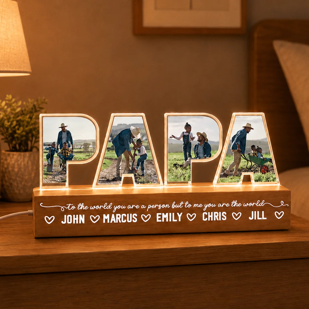 Personalized 'PAPA' lamp with family photos and names on a wooden base.