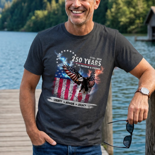 Man wearing a t-shirt with an eagle and American flag design by a lake