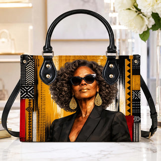 Stylish african american woman art tote bag with golden accents and tribal geometric patterns, perfect elegant gift.