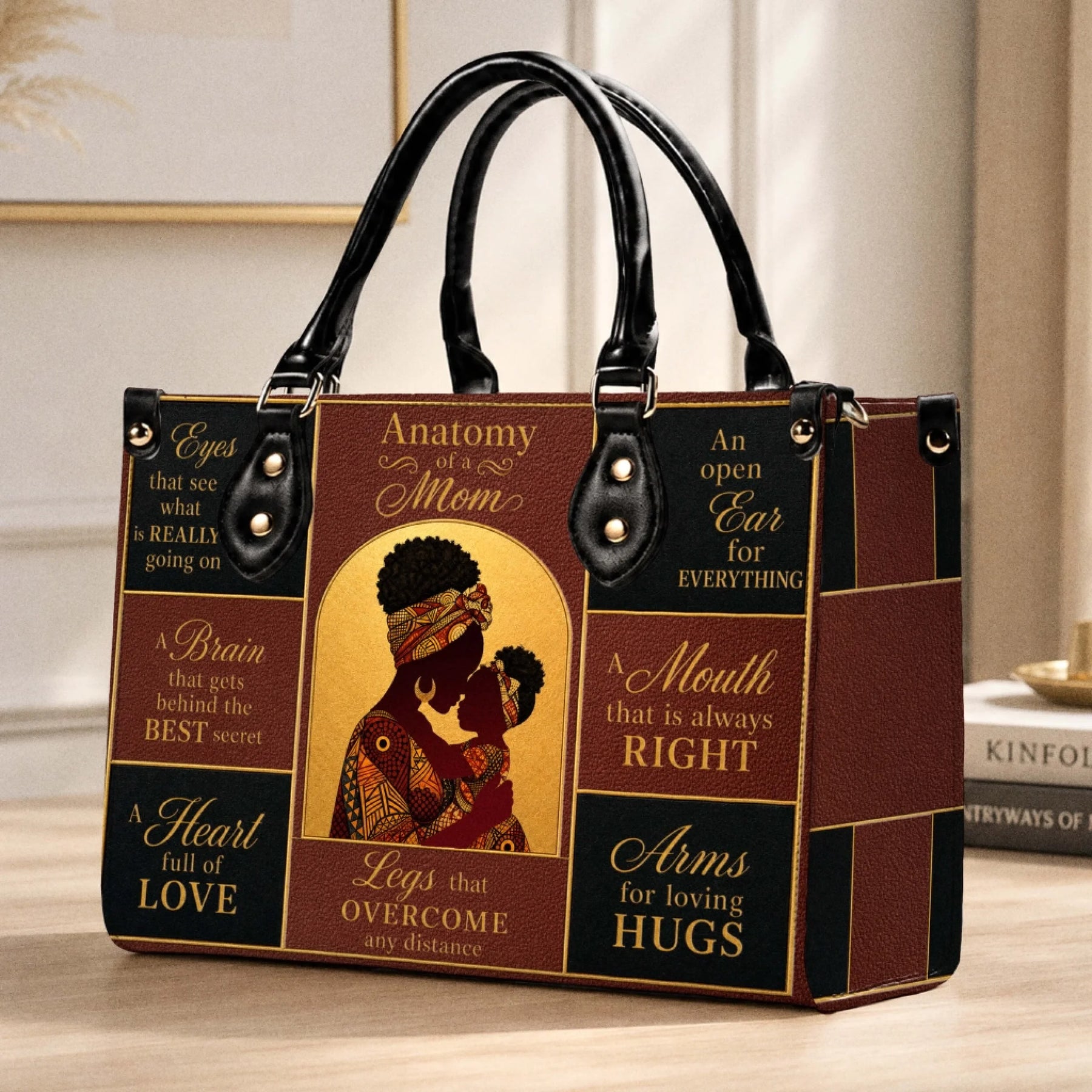Elegant Anatomy of a Mom leather handbag showcasing African American mother and child theme for mom gifts.