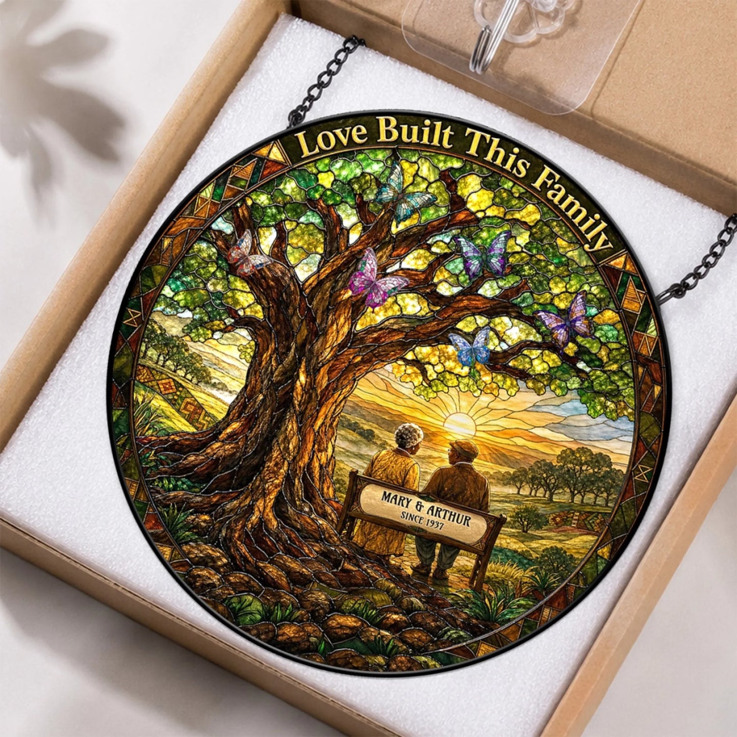 Personalized stained glass window hanging with a sunset theme and family quote for a thoughtful anniversary gift.