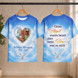 Custom memorial T-shirt featuring a heart photo frame, doves, and German sympathy quote for a celebration of life.