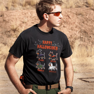 Black custom Halloween t-shirt featuring four illustrated dachshund dogs in costumes with their names printed below.