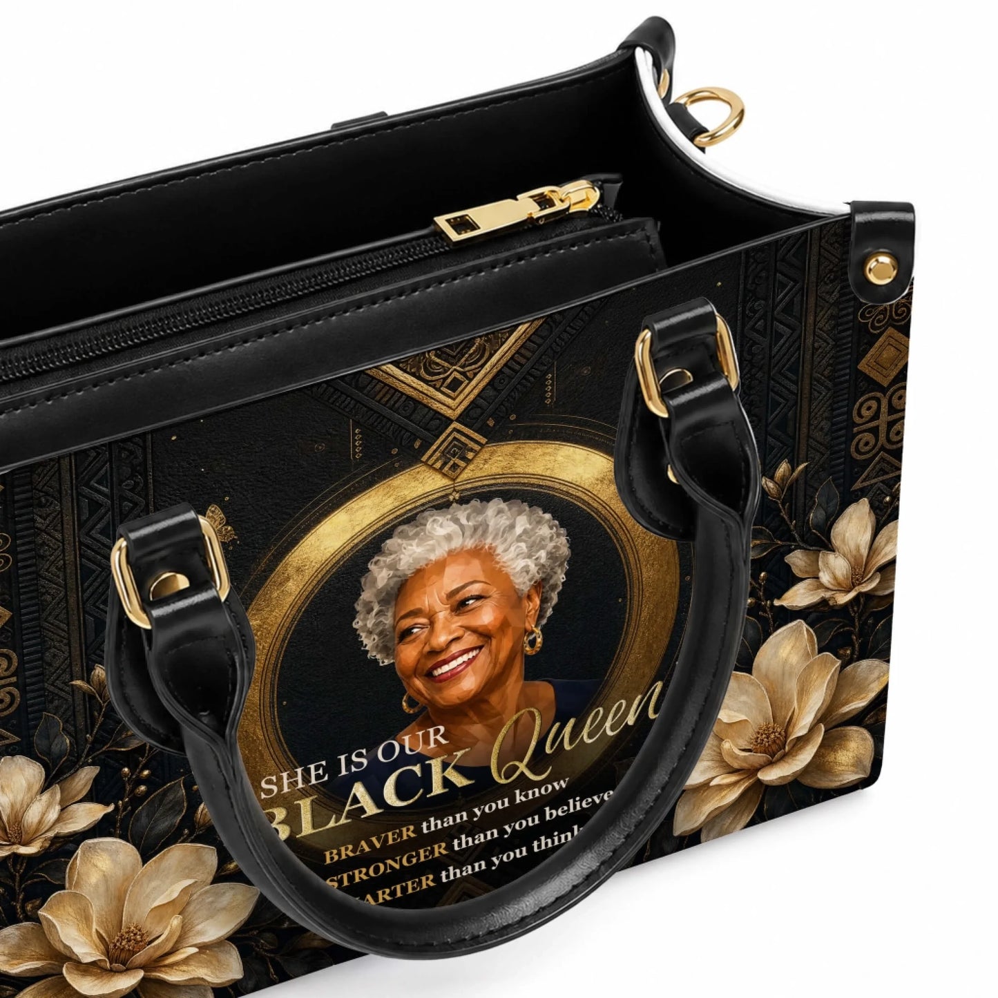 Black leather tote bag featuring a portrait of an elegant woman with the quote She Is Our Black Queen and floral art.